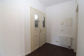 TOP INVESTMENT // Frisch renovierte 2-Raum-Wohnung in begehrter Stadtlage - Eingang